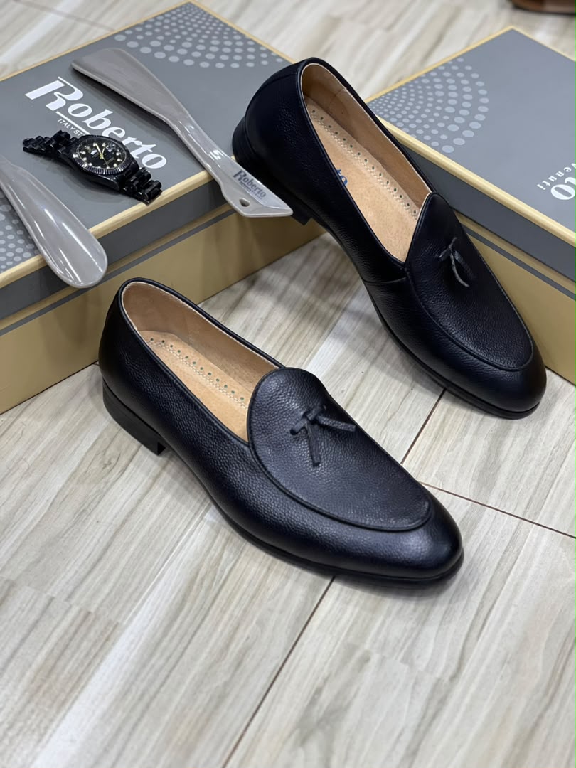Black leather Belgian-style bow loafers