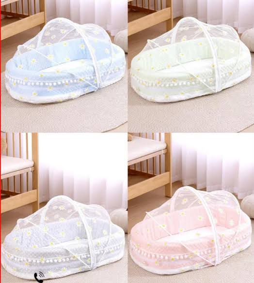 Portable fibre puffed baby nest bed