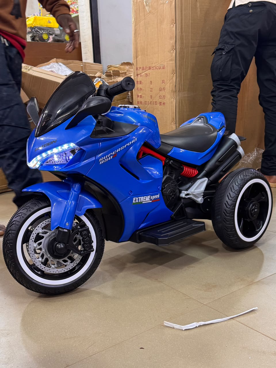 Children's battery-operated ride-on motorcycle